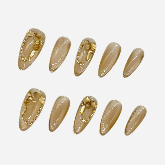 Elegant Gold Sheer Press On Nails – 3D Pearl & Chain Stiletto