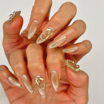 Elegant Gold Sheer Press On Nails – 3D Pearl & Chain Stiletto