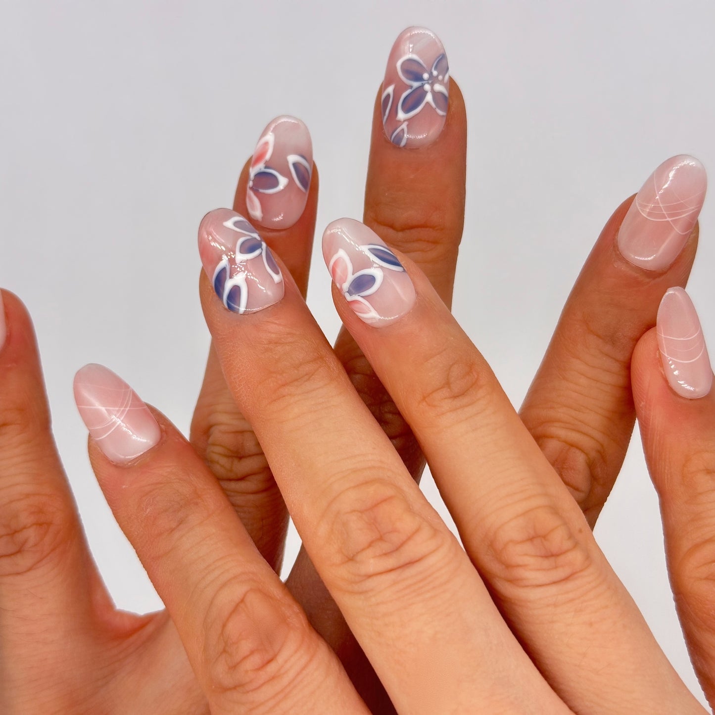 Hand-Painted Floral Press On Nails – Sheer Nude Stiletto